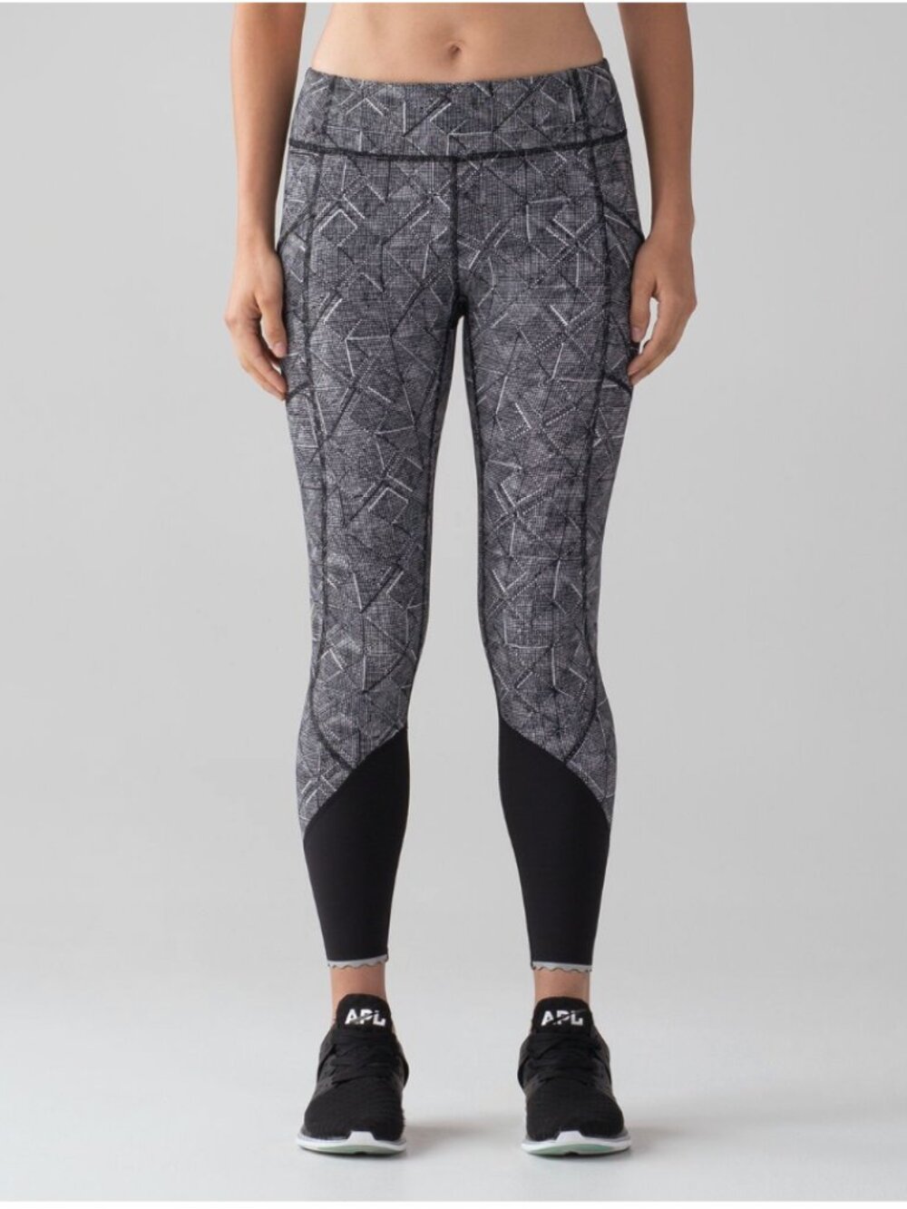 Lululemon Inspire Tight Stuff- side pockets -hem detail/reflective women’s sz 8